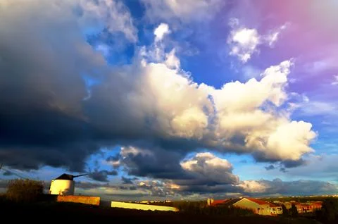 Rural landscape with a windmill Stock Photos