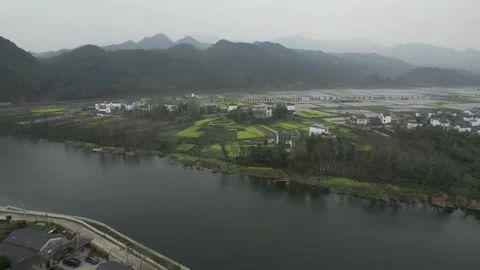 Rural River Beside Fields And Village in Anhui, China Stock Footage 344039246
