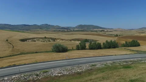 Rural Road Through Open Countryside Stock Footage 327633475
