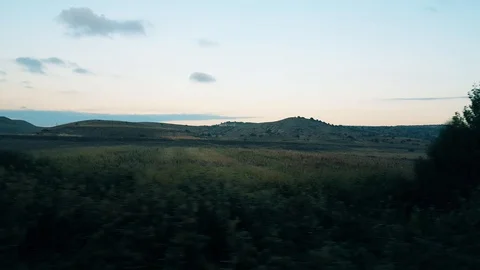 Rural scene through the passenger train window Video stock 95700131
