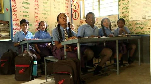 Rural school student learning  in the classroom of their school Foto stock