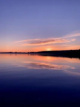 Rural sunset over the river Stock Photos