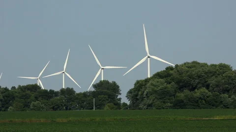 Rural Wind Turbines Generating Clean Energy In a Line Stock Footage 41852426