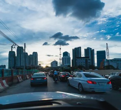 Rush hour after work and traffic jam in the evening Stock Photos