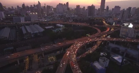 Rush Hour On Busy Road Intersection In Downtown Bangkok, Thailand, At Dusk, Video stock 79978984