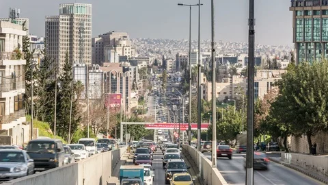 Rush hour car traffic in Abdali district of Amman, Jordan Stock Footage 107847575
