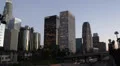 Rush Hour on Freeway, Commute, Dusk Downtown Los Angeles, LA, California, USA HD Footage