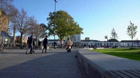Rush hour in front of Leeuwarden train station Stock Footage 220429795