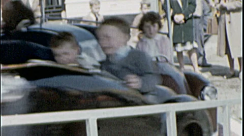 RUSH HOUR KIDS RIDE Tiny Cars Amusement Park 1950s Vintage Film Home Movie 8mm Stock Footage 32507139