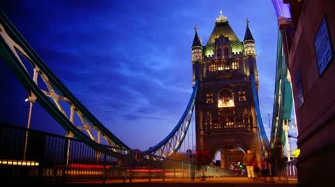 Rush hour in London, view to the Tower Bridge night Stock Footage