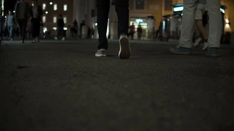Rush Hour in Piazza Di Spagna Square Tourists Walking on Cobbled Street at night Stock Footage 99261663