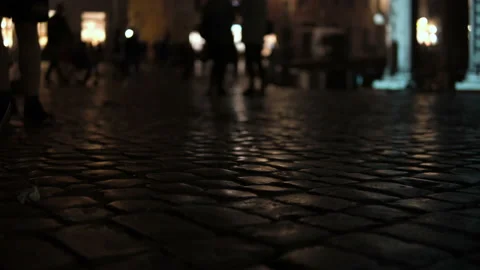 Rush Hour in Piazza Di Spagna Square Tourists Walking on Cobbled Street at night Stock Footage 99261692