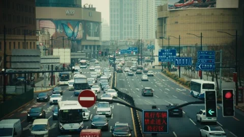 Rush Hour — Shanghai City Centre Intersection from a Pedestrian Bridge Stock Footage 339894121