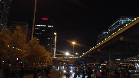 Rush hour traffic after work in Guomao Business District in evening,Beijng,China Stock Footage 143170564