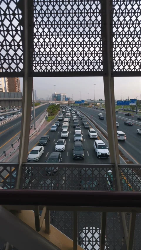 Rush-hour traffic builds up on Sheikh Rashid Road towards Sharjah Video stock 345626712