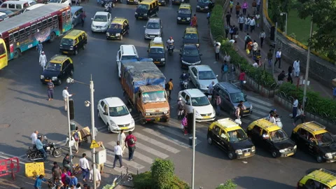 Rush Hour Traffic at Busy Intersection Near Crawford Market in Mumbai, India Video stock 144006491