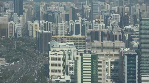 Rush hour traffic drives through central Abu Dhabi, urban Middle East Stock Footage 48864881