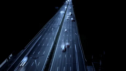 Rush hour traffic on a freeway at night. Time lapse, UHD 4K Stock Footage 96374064