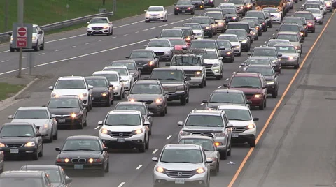 Rush hour traffic jam on major highway running through city of Toronto Stock Footage 50195328