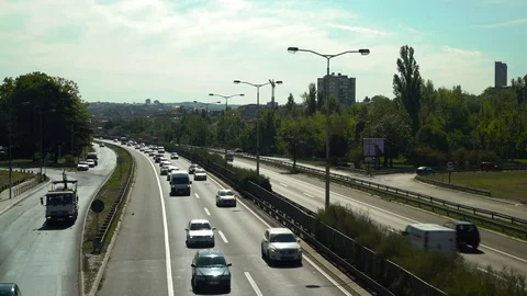 Rush hour, traffic jam, vehicles driving on freeway road, high angle view. Stock Footage 82468483