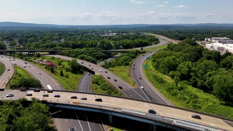 Rush hour traffic on a major highway with heavy vehicle flow during... Vídeos de archivo 340657924
