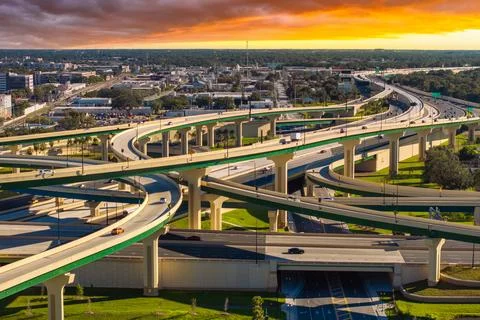 Rush hour traffic on multi-lane highway in Orlando, Florida. Fast rhythm of.. Stock Photos