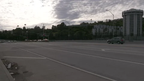 Rush Hour Traffic Sunset Blvd at 405 Freeway in Brentwood Covid 19 Stock Footage 136712062