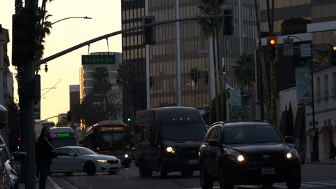 Rush hour traffic on Wilshire Blvd at golden hour, Los Angeles Stock Footage 124181953