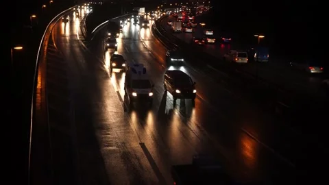 Rush hour on the wet city freeway in the evening in Berlin. Stock Footage 220188508