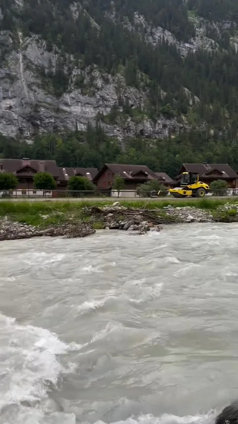 Rushing Alpine River in Mountain Valley Stock Footage 339881639