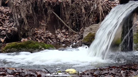 Rushing foamy water. Fast-running stream Stock Footage 104879245