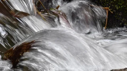 Rushing foamy water. Fast-running stream Stock Footage 104879324