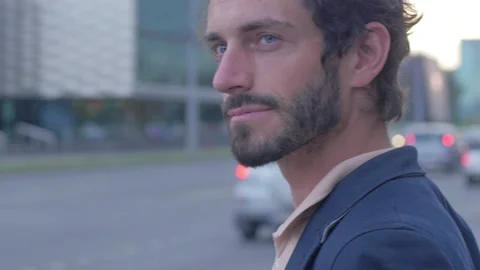 Rushing man trying to cross a busy city street Stock Footage 132945997