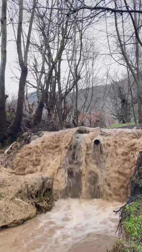 Rushing Muddy Waterfall in Mountain Forest Stock-Footage 340871220