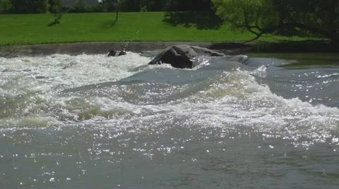 Rushing Rapids &amp; People on Bikes Video stock 11241405