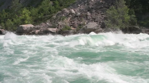 Rushing rapids with a rock pile Stock Footage 41178040