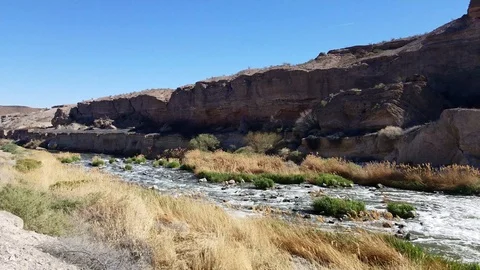 Rushing river in the desert Stock Footage 86037822