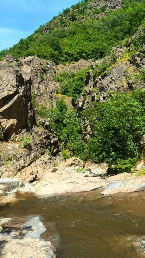 Rushing river flows through rocky. Vucjanka Canyon, Serbia. Vertical Stock Footage 341130796