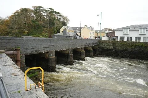 Rushing River Under Stone Bridge, Porthmadog, North Wales, Autumn Trees, Stock Photos