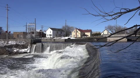 A rushing river of water from a set of falls. 4K or 1080p Stock Footage 61324330