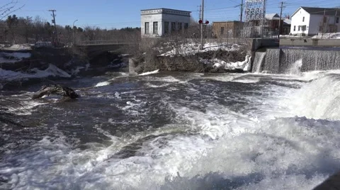 A rushing river of water from a set of falls. 4K or 1080p Stock Footage 61324370