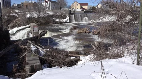 A rushing river of water from a set of falls. 4K or 1080p Stock Footage 61332814