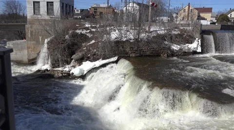 A rushing river of water from a set of falls. 4K or 1080p Stock Footage 61335673