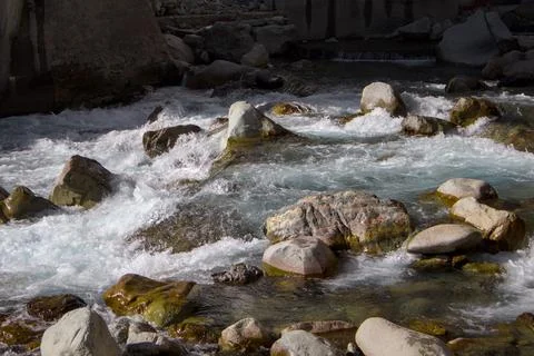 Rushing River Waters Over Rocks in a Pristine Natural Setting Stock Photos
