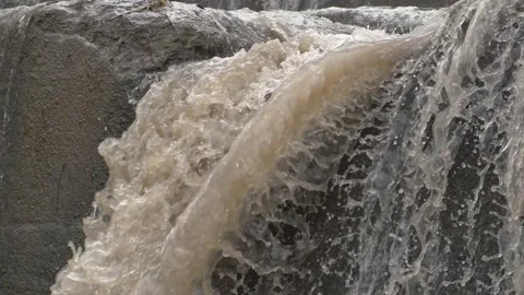 The rushing stream of a creek at close range Stock Footage 234945596