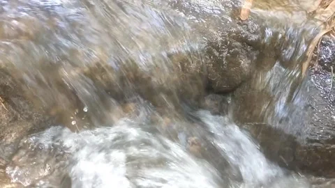 Rushing Stream over Rocky Terrain Video stock 334663088