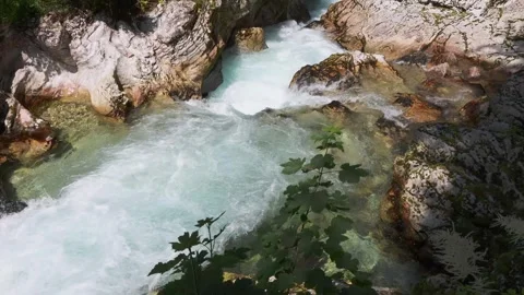 Rushing Turquoise River with Small Waterfalls and White Water Rapids Stock Footage 335264600