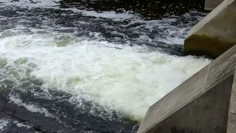 Rushing water from a dam Stock Footage 135770227