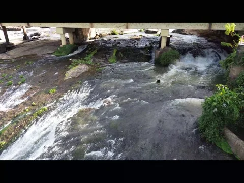 Rushing Water Flowing Over Rocks, Aerial Drone Shot Stock Footage 341830418