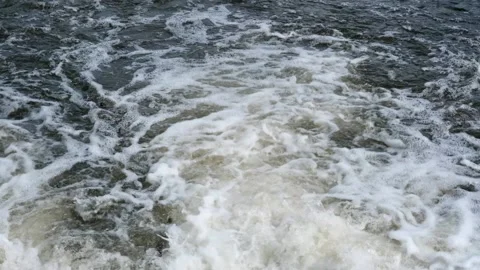 Rushing water in a mountain shallow river Stock Footage 131664771